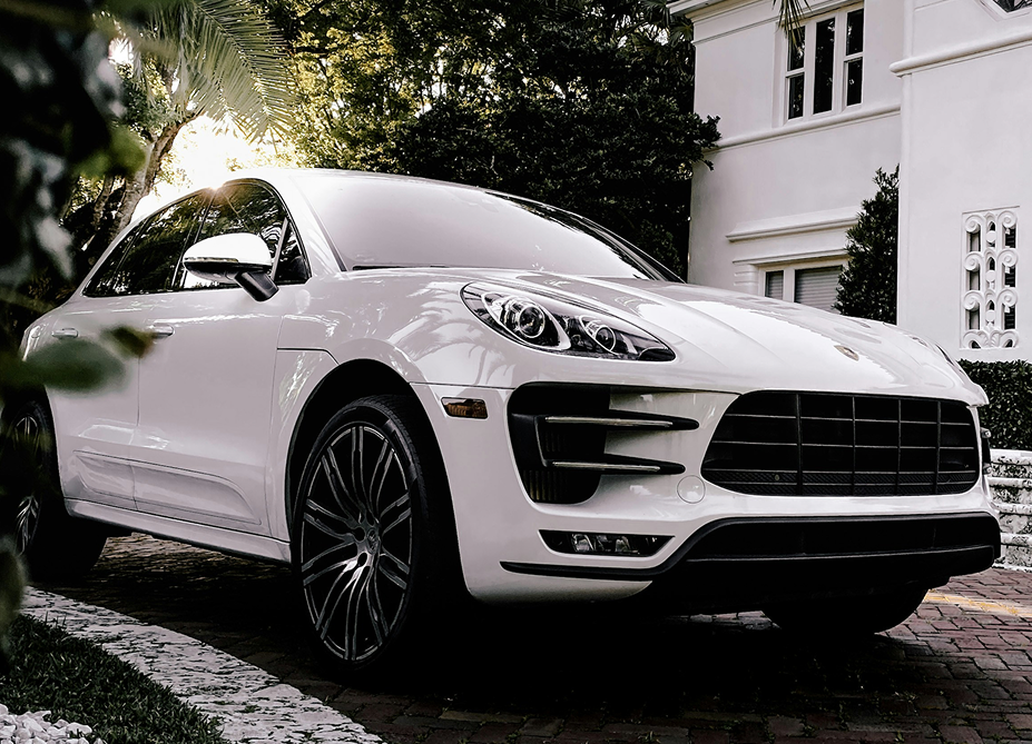 Luxury white Porsche vehicle showcasing modern design